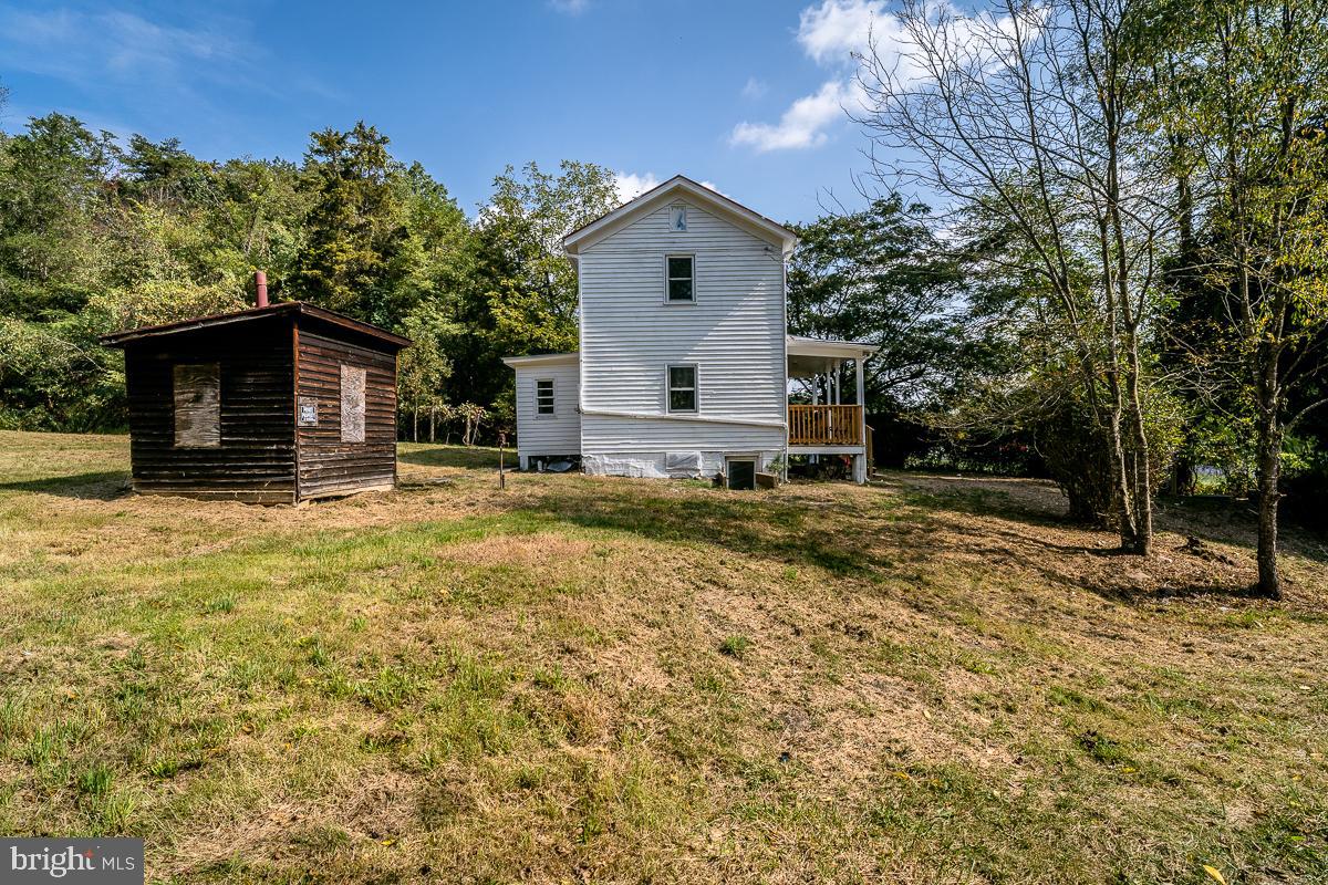 4771 Mill Creek Road Mount Jackson, VA 22842 - Photo 18 of 29 a house with trees in the background
