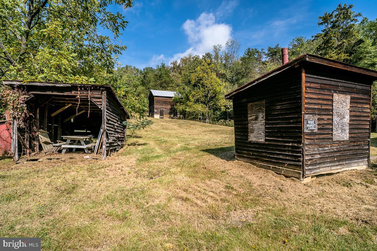 4771 Mill Creek Road Mount Jackson, VA 22842 - Photo 20 of 29 a view of house with backyard and seating area