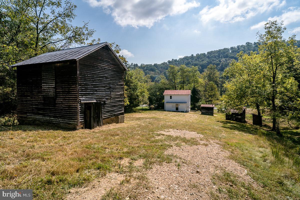 4771 Mill Creek Road Mount Jackson, VA 22842 - Photo 25 of 29 a view of a house with a yard