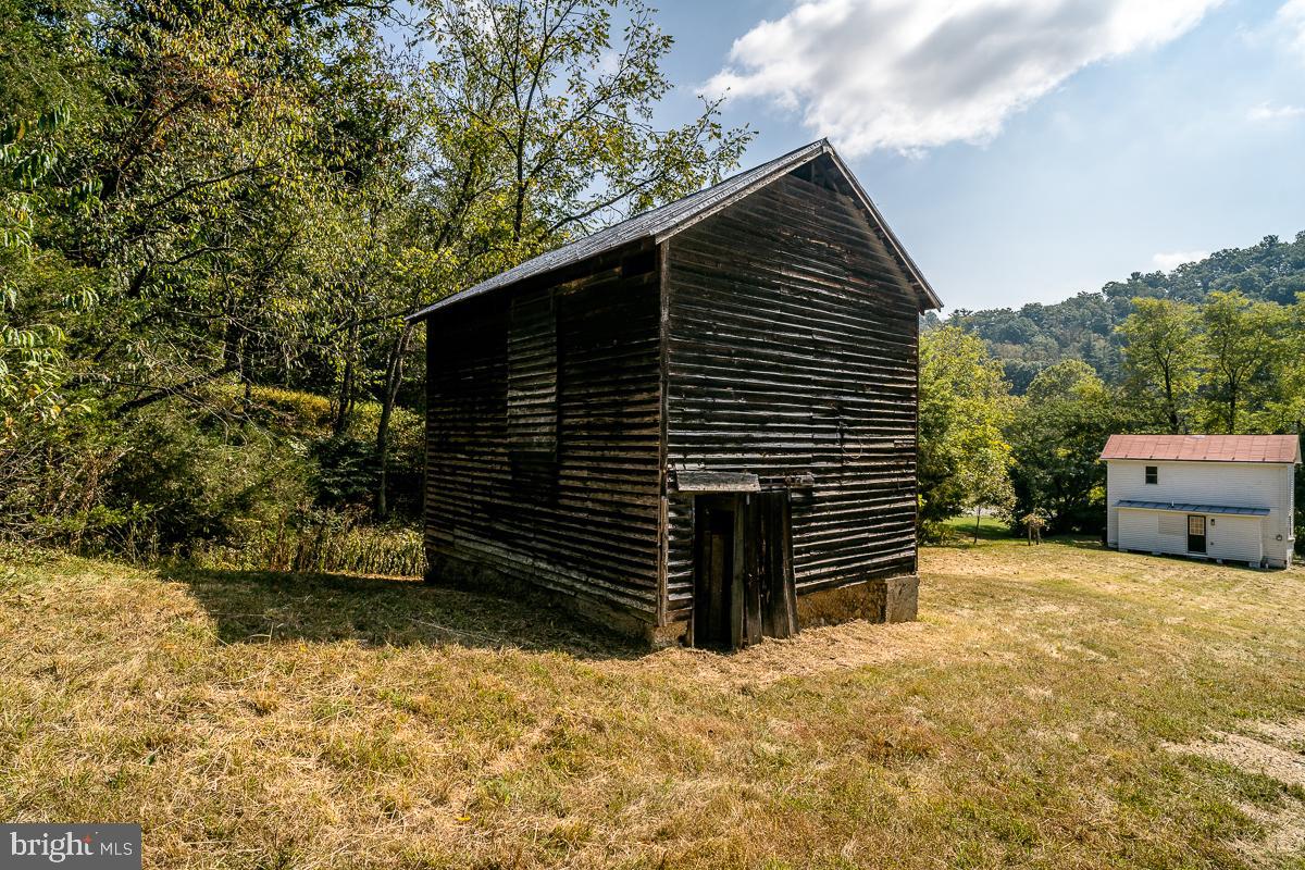 4771 Mill Creek Road Mount Jackson, VA 22842 - Photo 26 of 29 a backyard of a house