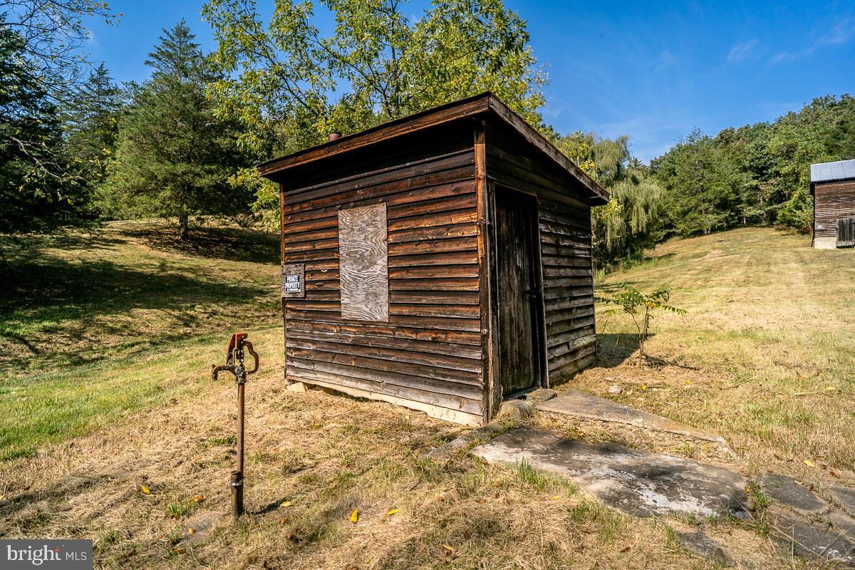4771 Mill Creek Road Mount Jackson, VA 22842 - Photo 29 of 29 a view of wooden house with a large trees
