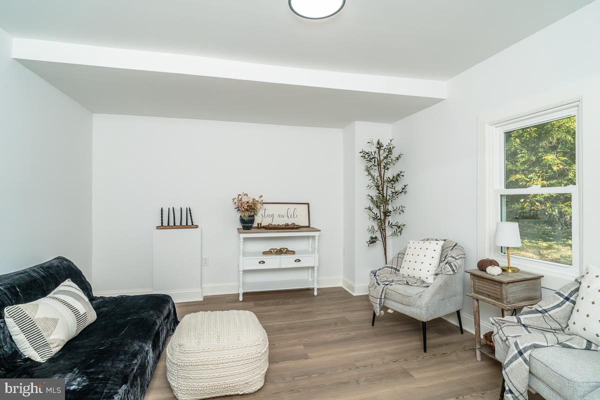 4771 Mill Creek Road Mount Jackson, VA 22842 - Photo 6 of 29 a living room with furniture and a window