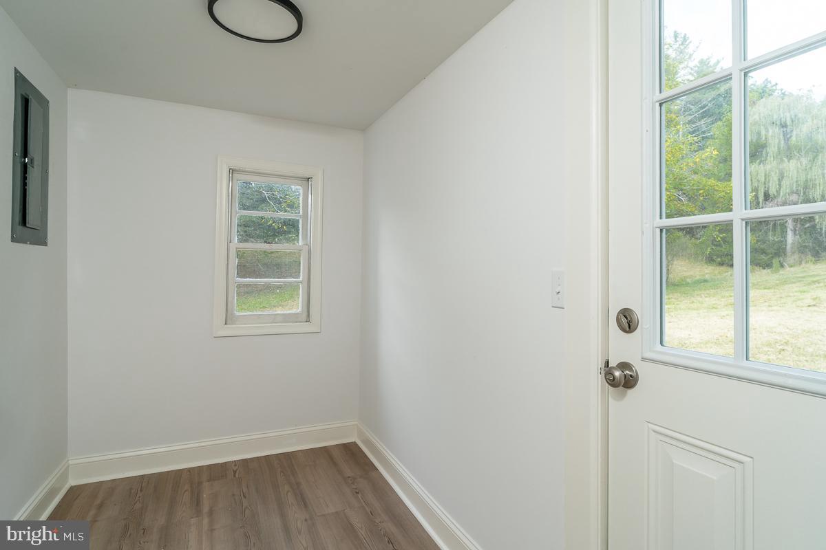 4771 Mill Creek Road Mount Jackson, VA 22842 - Photo 7 of 29 a view of a room that has a window in it