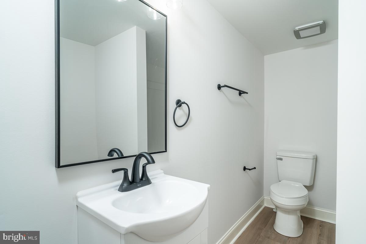 4771 Mill Creek Road Mount Jackson, VA 22842 - Photo 8 of 29 a bathroom with a sink toilet and a mirror