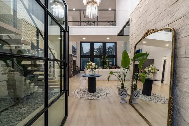 a view of a balcony with potted plants