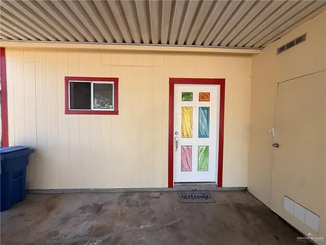 a view of an empty room with window