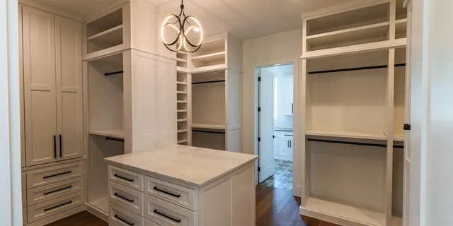 a kitchen with a refrigerator and countertop