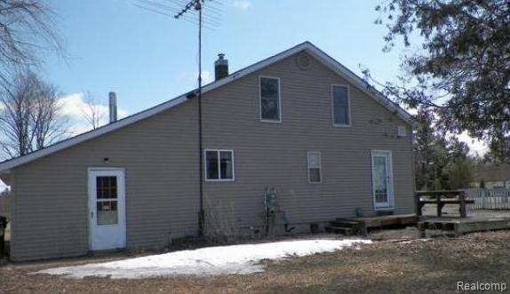 230 South Merritt Road Merritt, MI 49667 - Photo 6 of 7 7143924848 Rear view.JPG