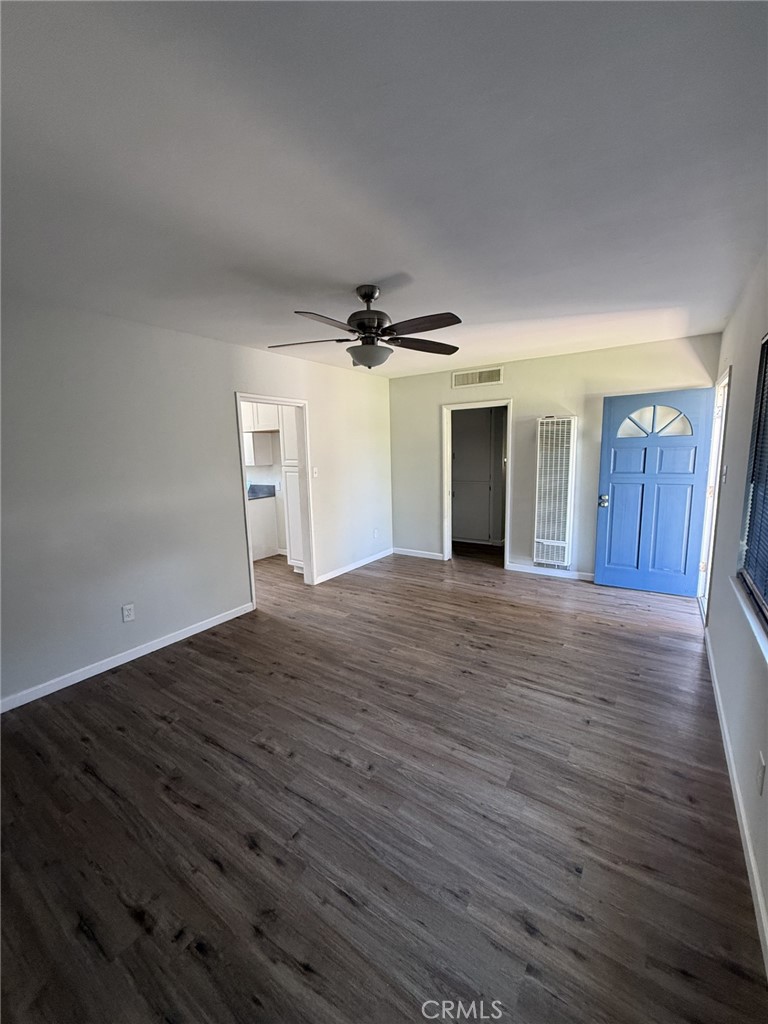 319 Elm Street Shafter, CA 93263 - Photo 4 of 14 a view of a livingroom with wooden floor