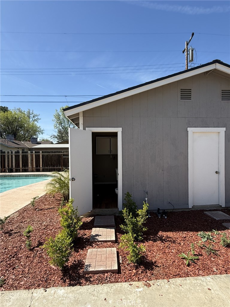 319 Elm Street Shafter, CA 93263 - Photo 8 of 14 a front view of house with yard