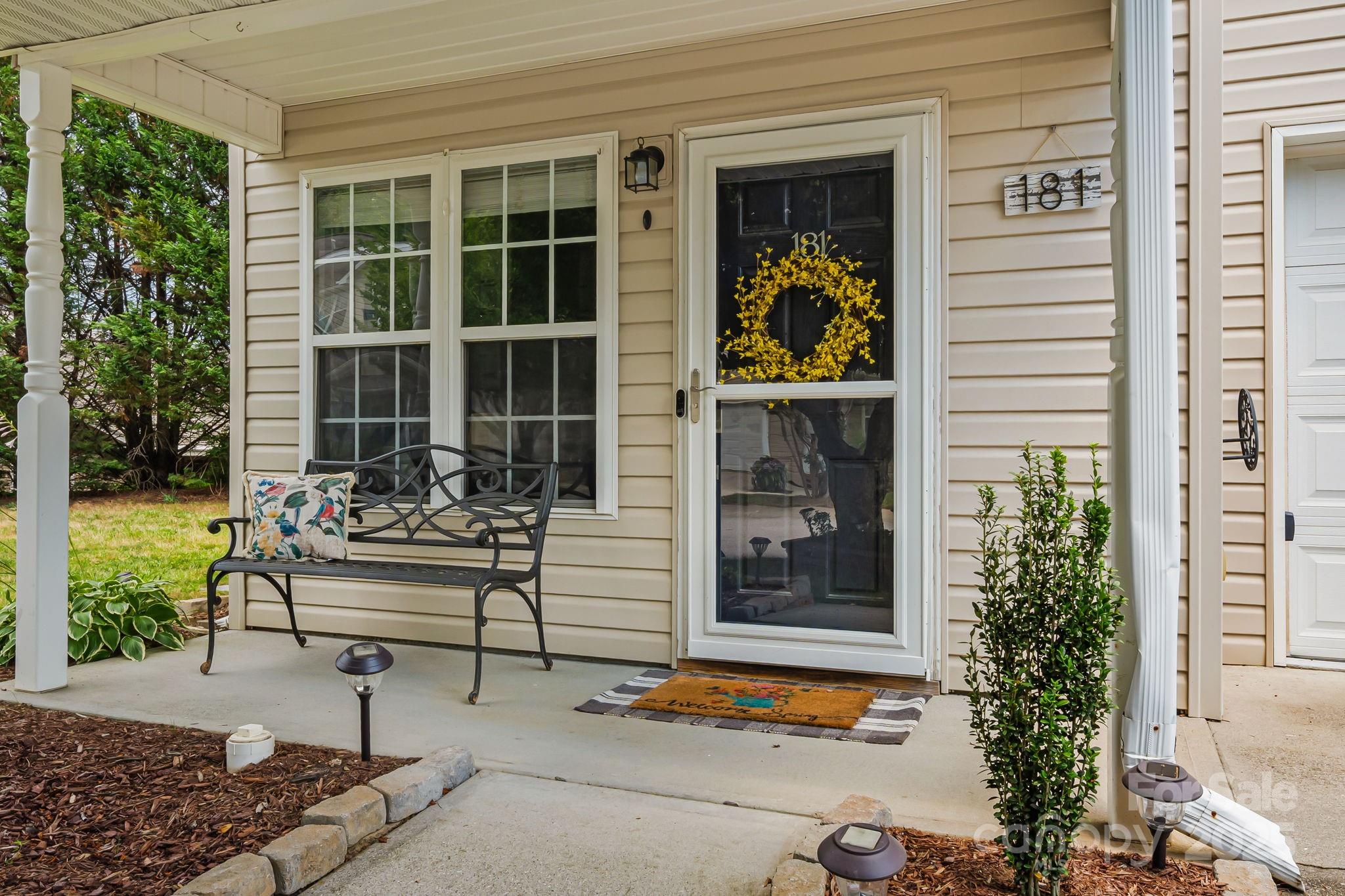 181 Farington Circle Fletcher, NC 28732 - Photo 1 of 33 a front view of a house with a yard
