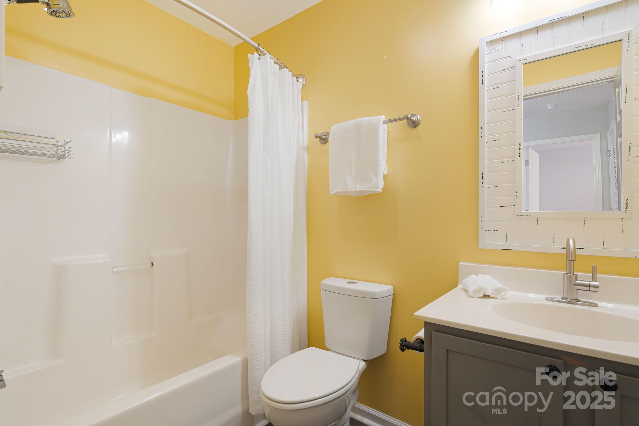 181 Farington Circle Fletcher, NC 28732 - Photo 19 of 33 a bathroom with a sink a toilet and shower