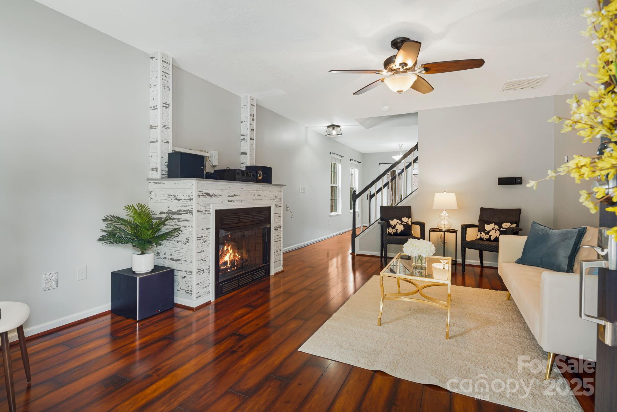 181 Farington Circle Fletcher, NC 28732 - Photo 2 of 33 a living room with furniture and a fireplace