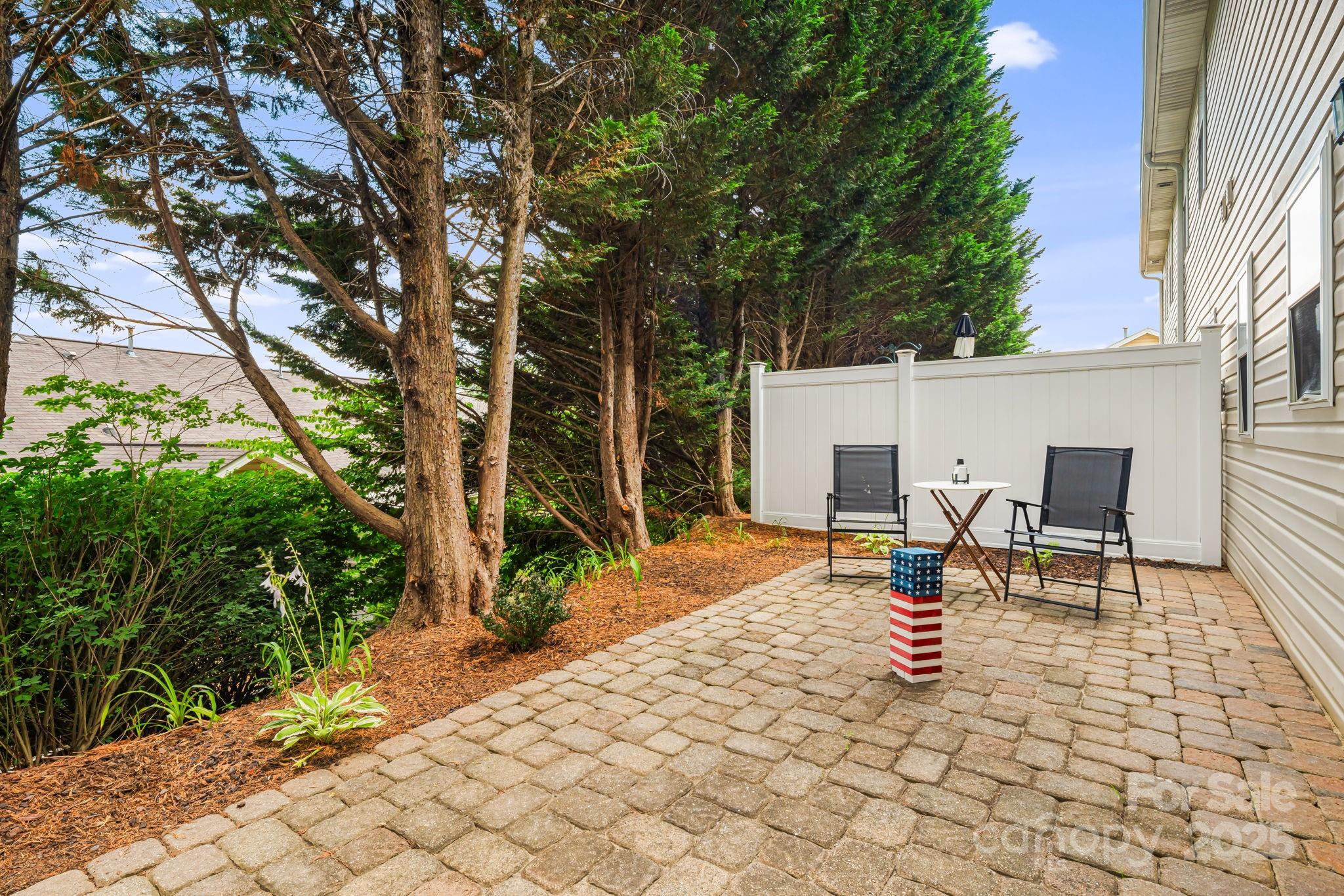 181 Farington Circle Fletcher, NC 28732 - Photo 25 of 33 a view of a patio with a chairs and table in a patio