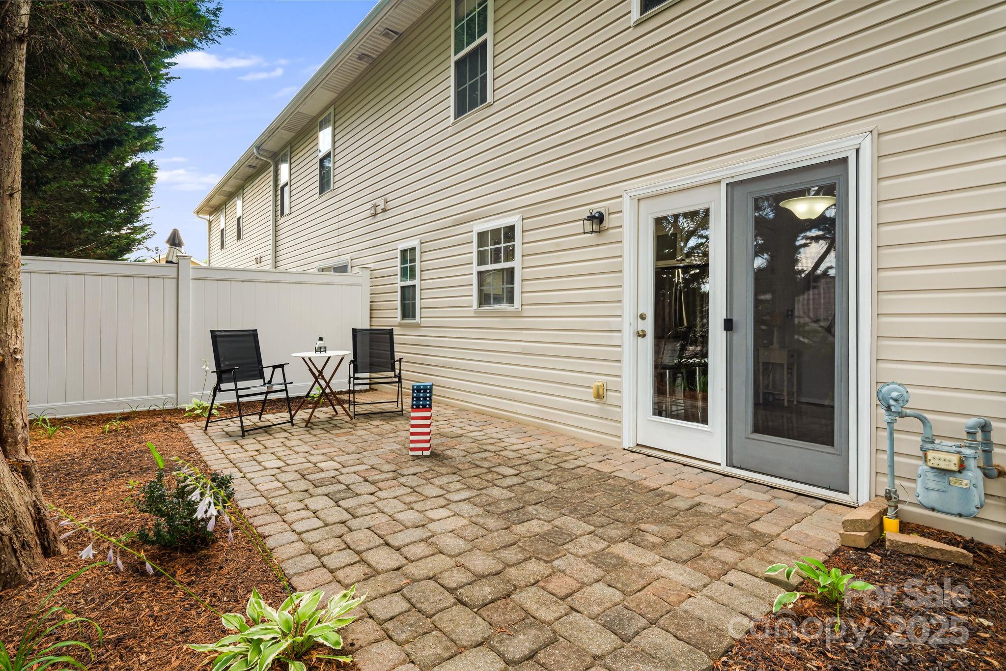 181 Farington Circle Fletcher, NC 28732 - Photo 26 of 33 a backyard of a house with seating space