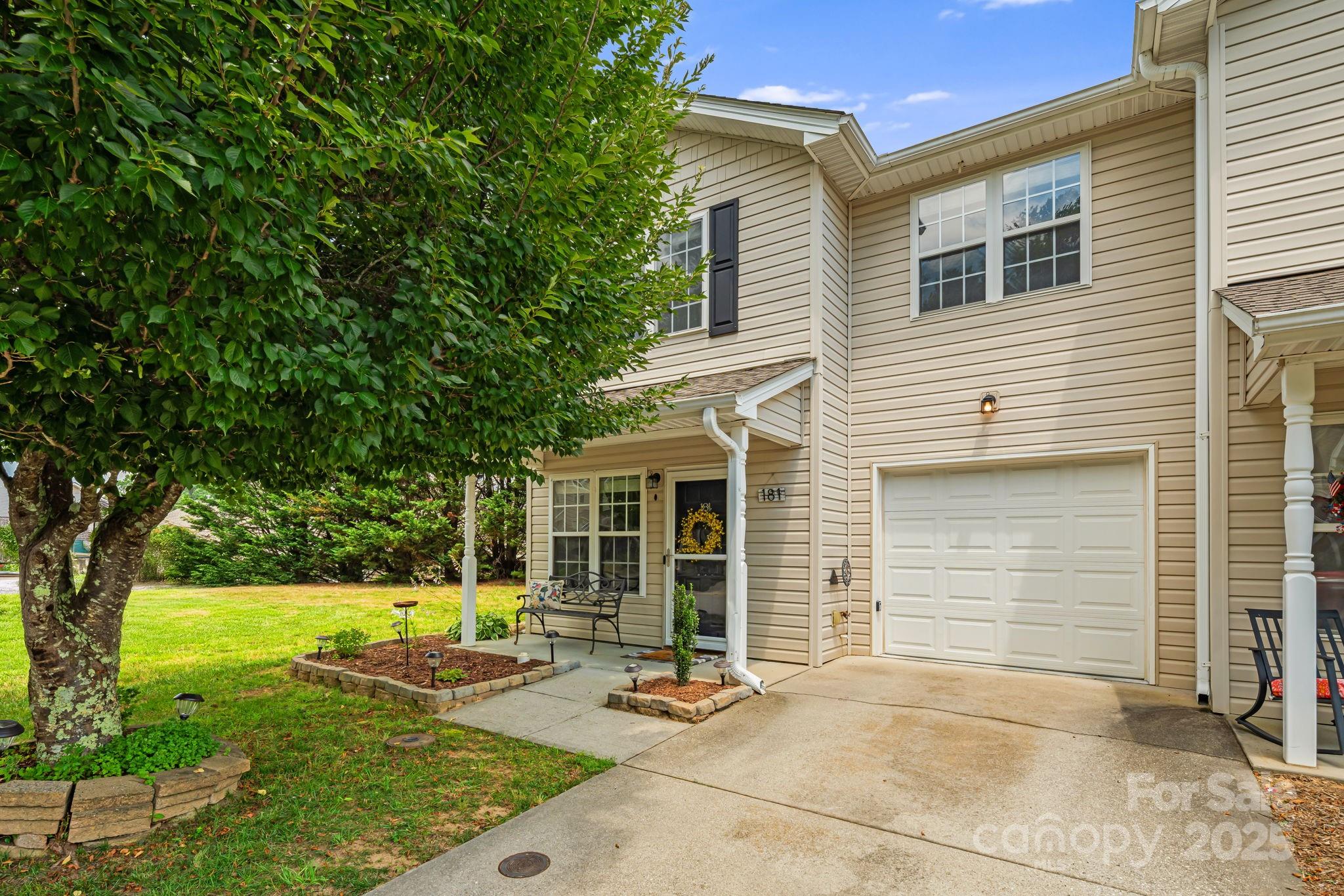 181 Farington Circle Fletcher, NC 28732 - Photo 28 of 33 a view of a house with backyard and sitting area