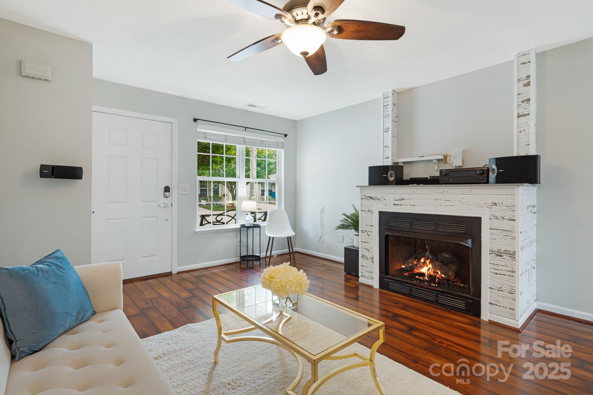 181 Farington Circle Fletcher, NC 28732 - Photo 4 of 33 a living room with furniture and a fireplace