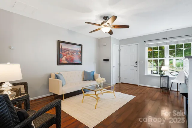 a living room with furniture and a window