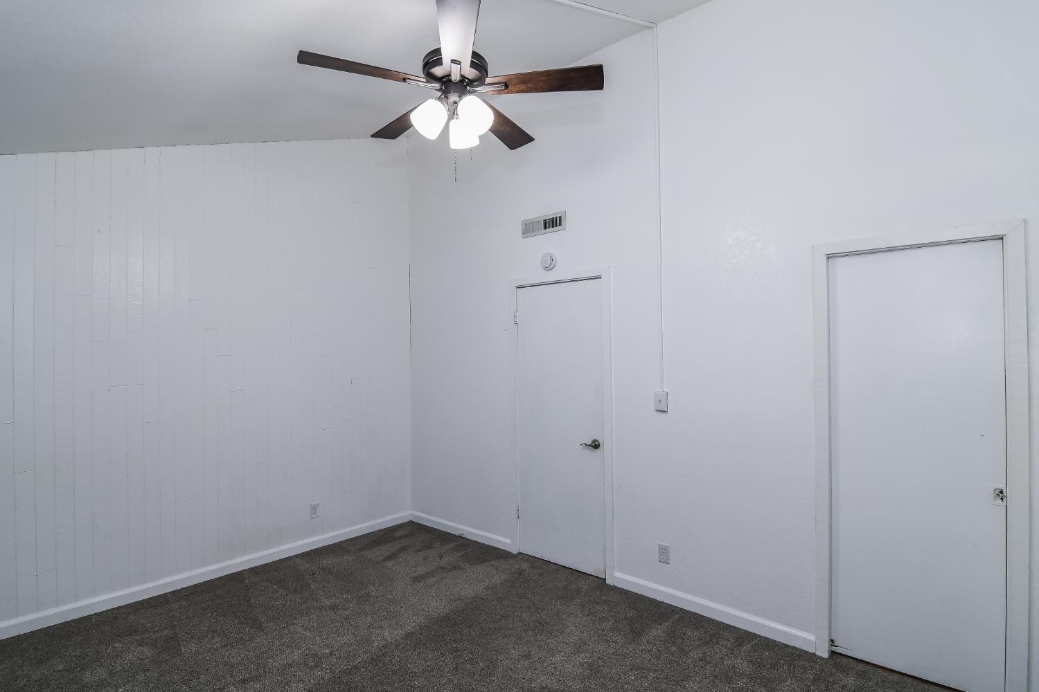 1139 Rivara Circle Sacramento, CA 95864 - Photo 39 of 72 an empty room with a fan & a ceiling fan