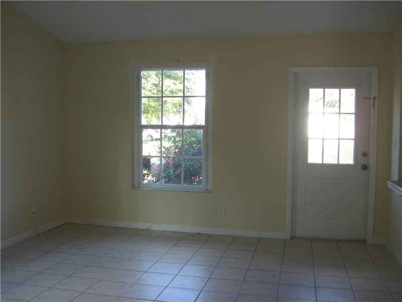 11197 Model Circle West Boca Raton, FL 33428 - Photo 9 of 23 an empty room with windows