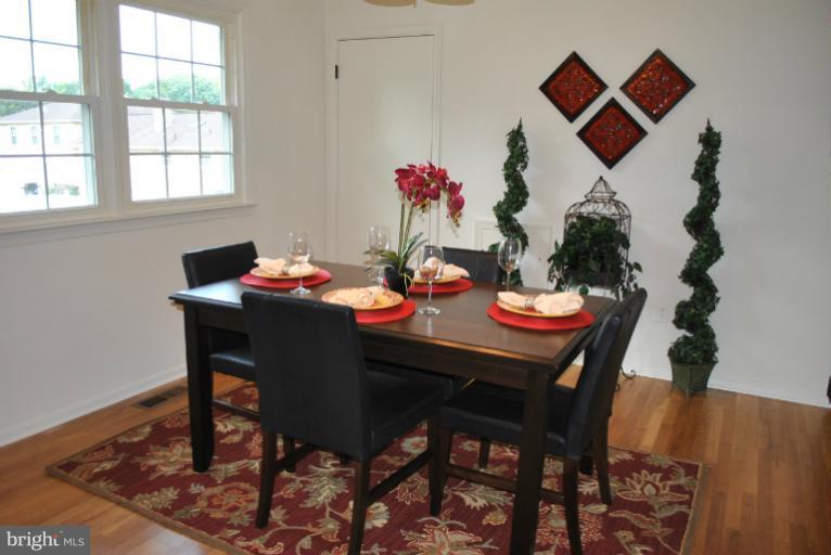 19516 Olney Mill Road Olney, MD 20832 - Photo 29 of 29 a dining room with furniture and window