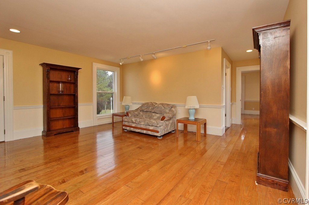 3005 Plank Road Kenbridge, VA 23944 - Photo 15 of 24 a living room with furniture and a wooden floor
