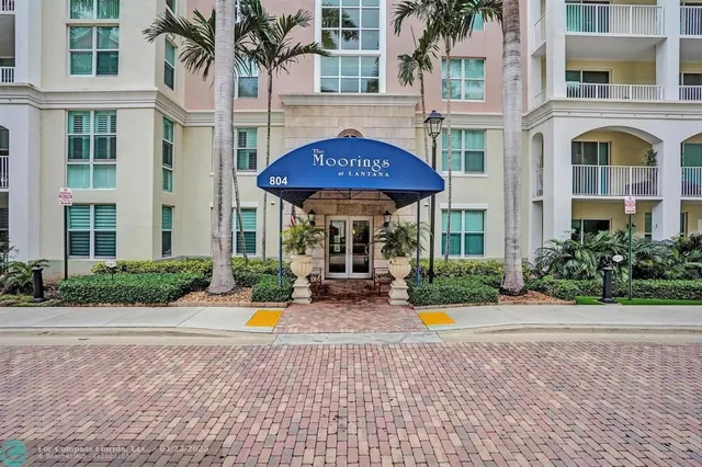 a view of a building with a swimming pool