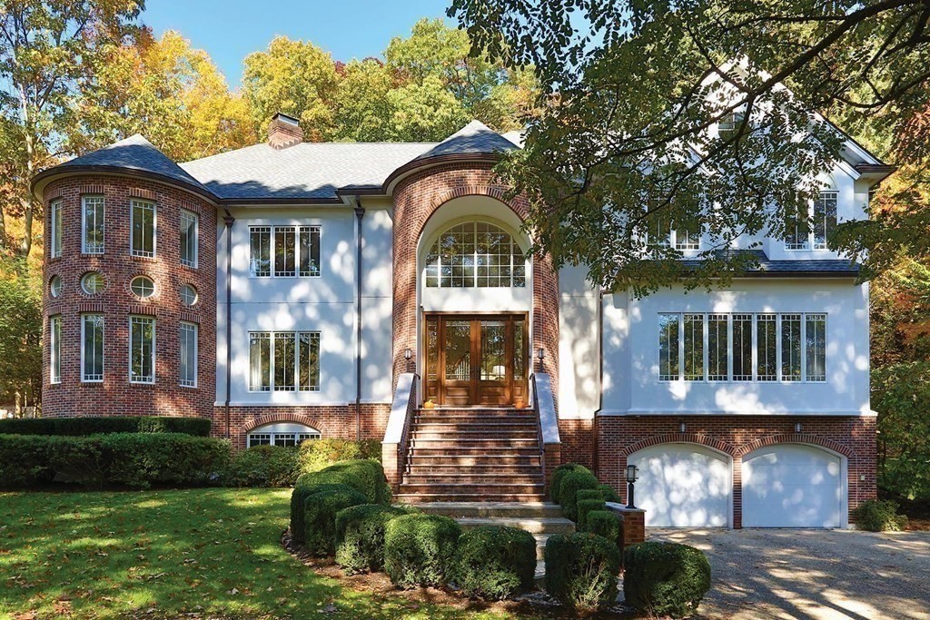 15 Laura Road Newton, MA 02468 - Photo 1 of 27 a front view of a house with yard and green space