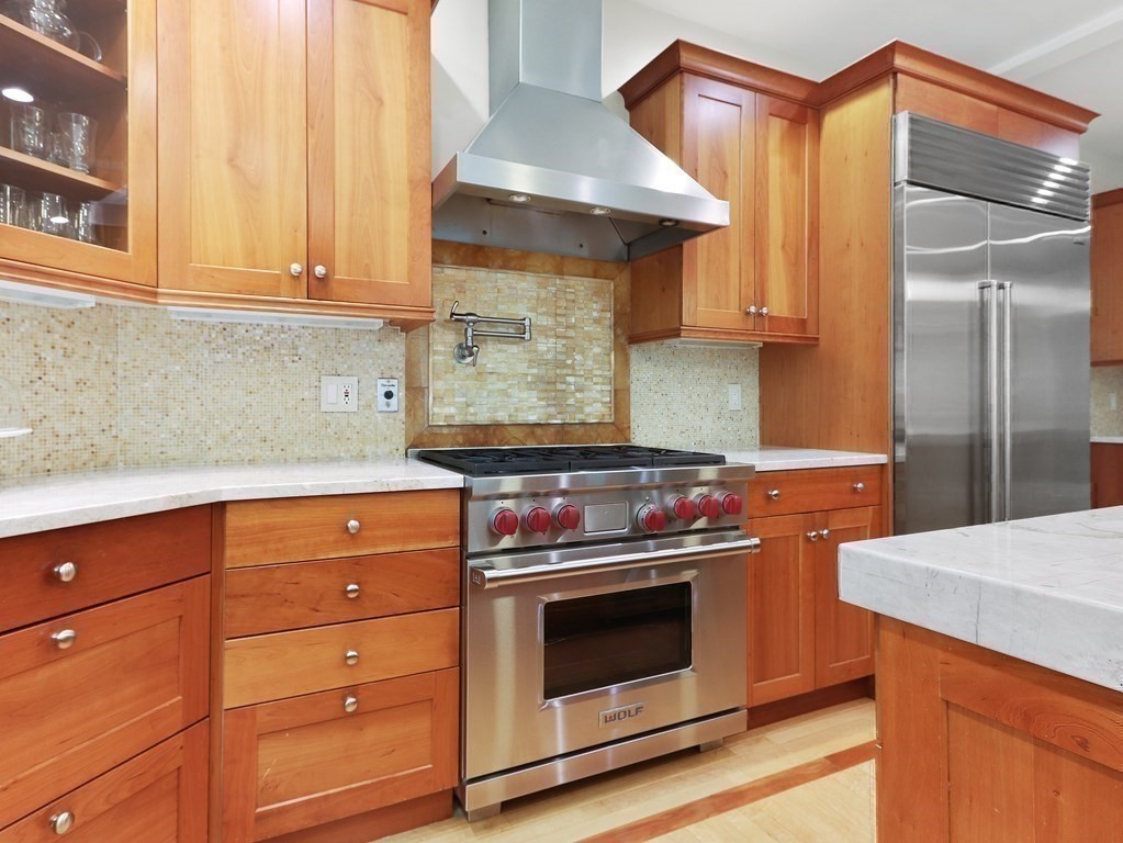 15 Laura Road Newton, MA 02468 - Photo 5 of 27 a kitchen with a stove and a microwave