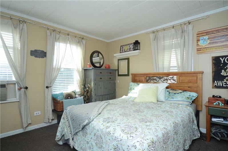 2006 Beaver Road Ambridge, PA 15003 - Photo 12 of 25 Mater bedroom with 3 windows that illuminate the room with natural light!