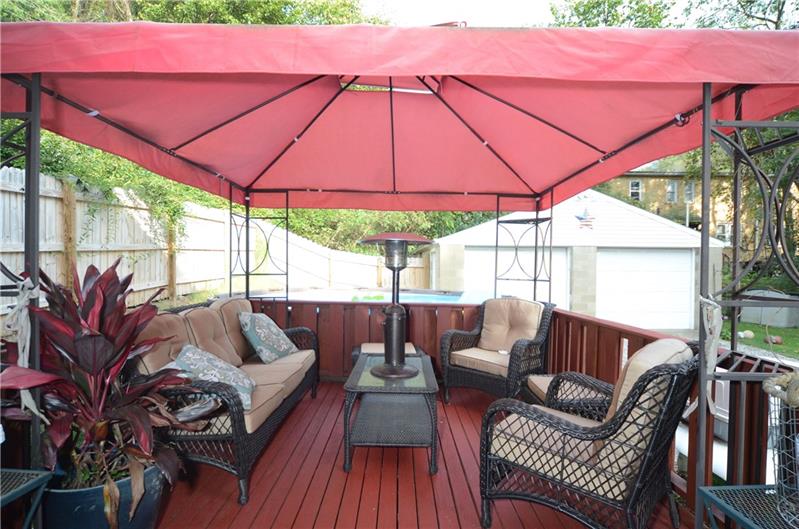 Freshly painted deck with Gazebo flows wonderfully from the kitchen. Great space for entertaining guests!
