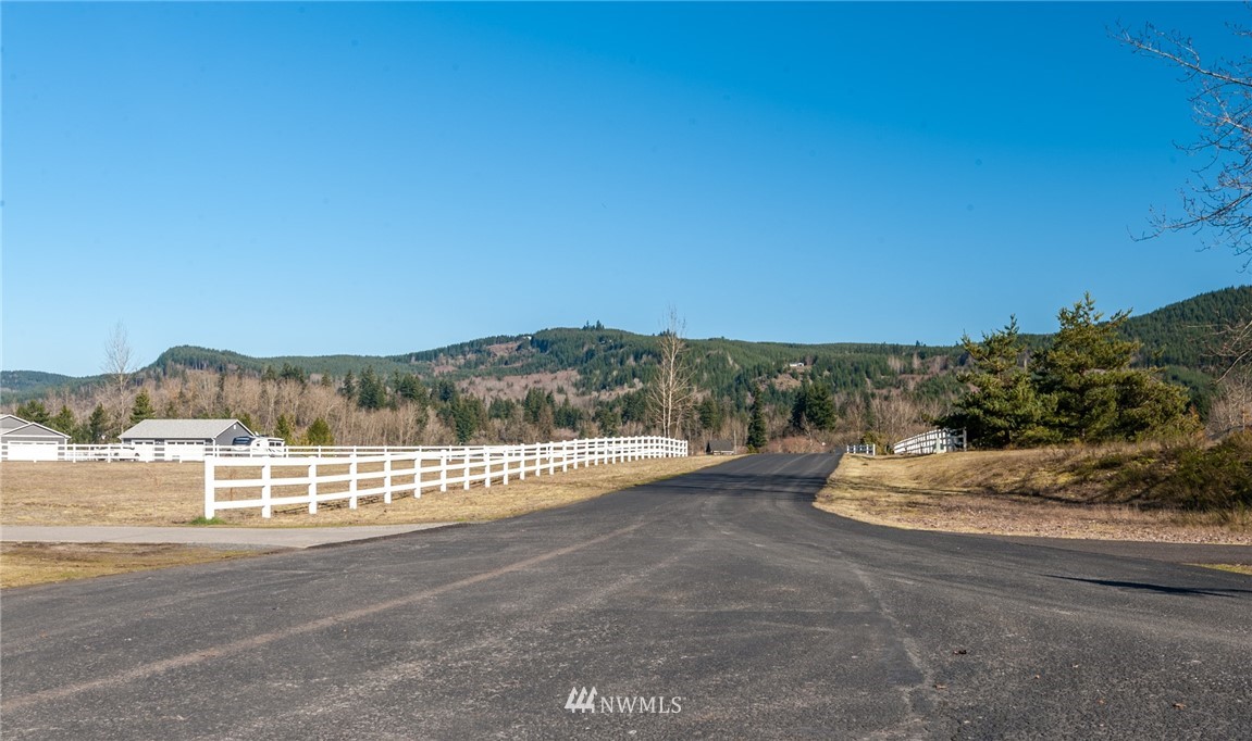 126 Chelsea Road Castle Rock, WA 98611 - Photo 11 of 34 a view of a road with an ocean view