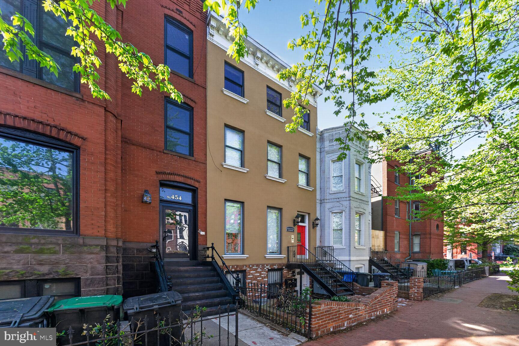 a front view of a building with street view