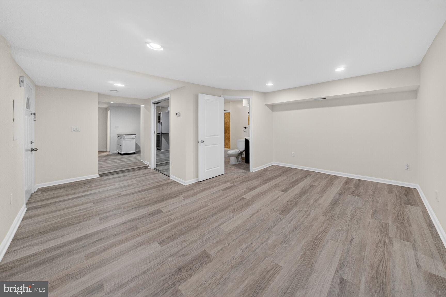 456 M Street Northwest, Unit 1 Washington, DC 20001 - Photo 3 of 19 a view of empty room with wooden floor