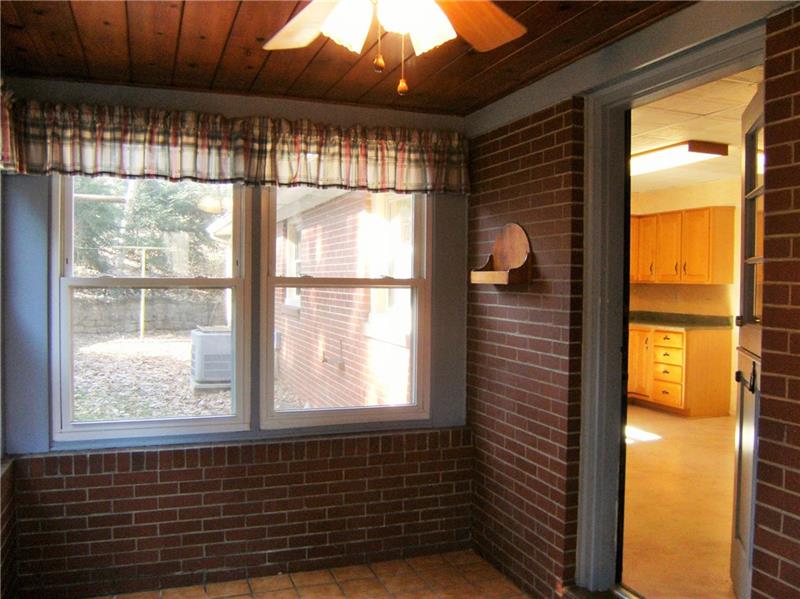1101 Gringo Road Aliquippa, PA 15001 - Photo 11 of 25 3 Season Room Looking In To Kitchen