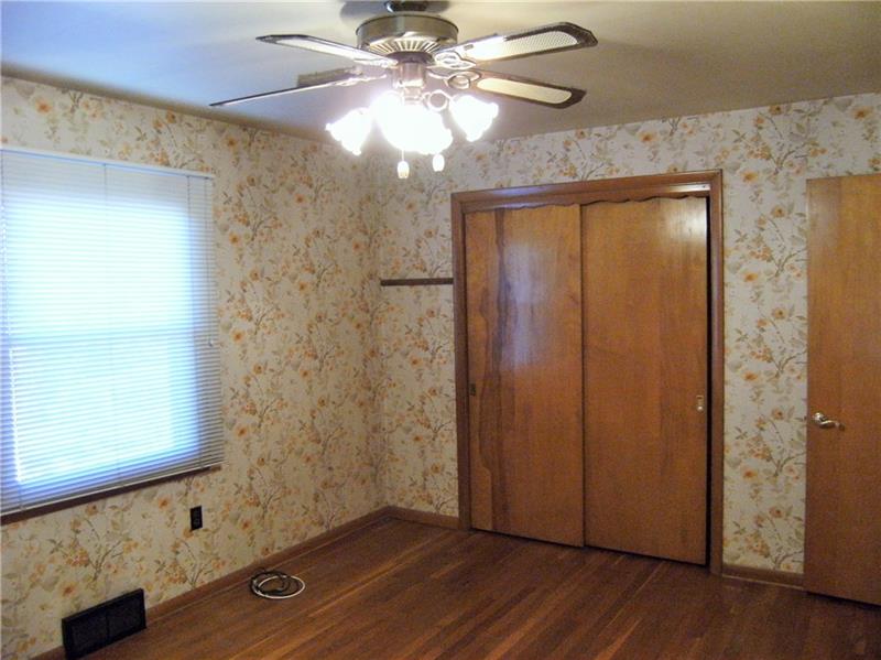 1101 Gringo Road Aliquippa, PA 15001 - Photo 12 of 25 Master Bedroom Showing Hardwood Floors