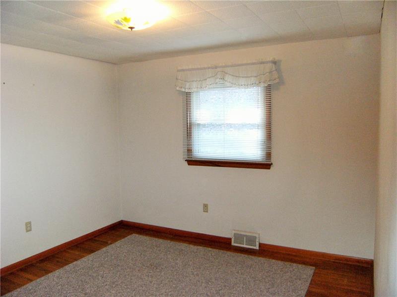 1101 Gringo Road Aliquippa, PA 15001 - Photo 16 of 25 Bedroom 3 Showing Hardwood Floors