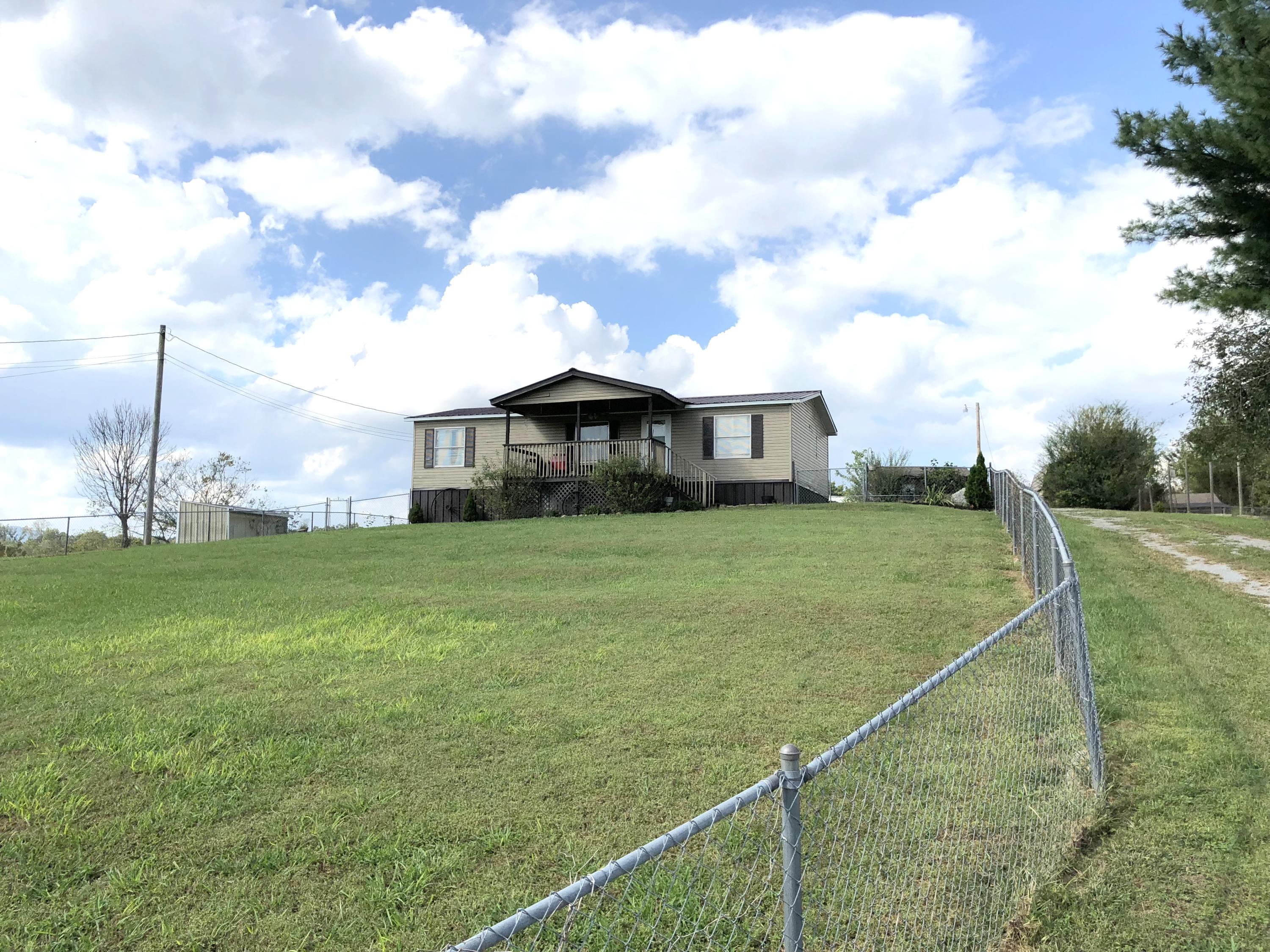 253 Landmark Road Jacksboro, TN 37757 - Photo 21 of 22 Front of home from road
