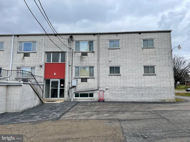 a front view of a building with street