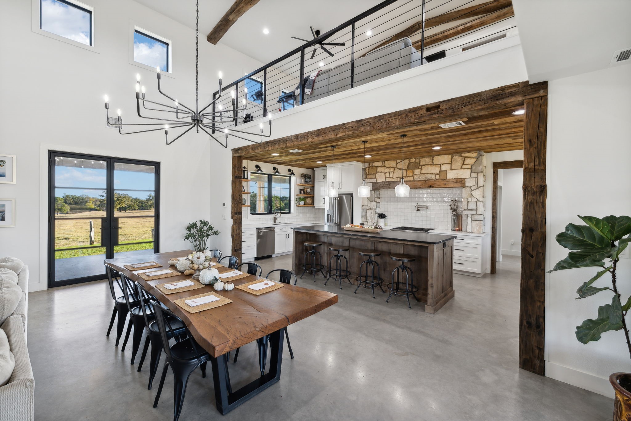 10433 County Road 162 Somerville, TX 77879 - Photo 12 of 40 a view of a dining area with furniture and a large window