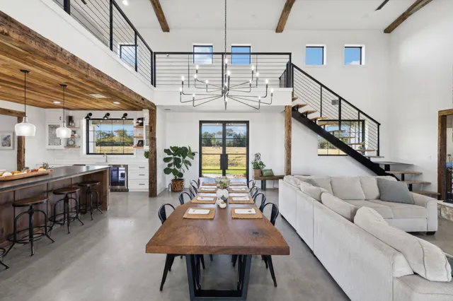 a kitchen with stainless steel appliances granite countertop a sink and cabinets