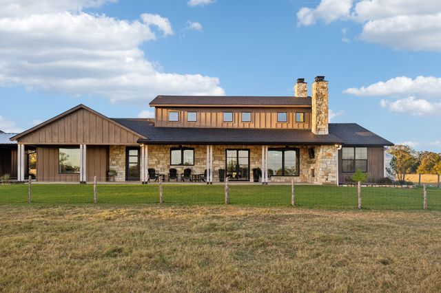 a view of swimming pool with lounge chair