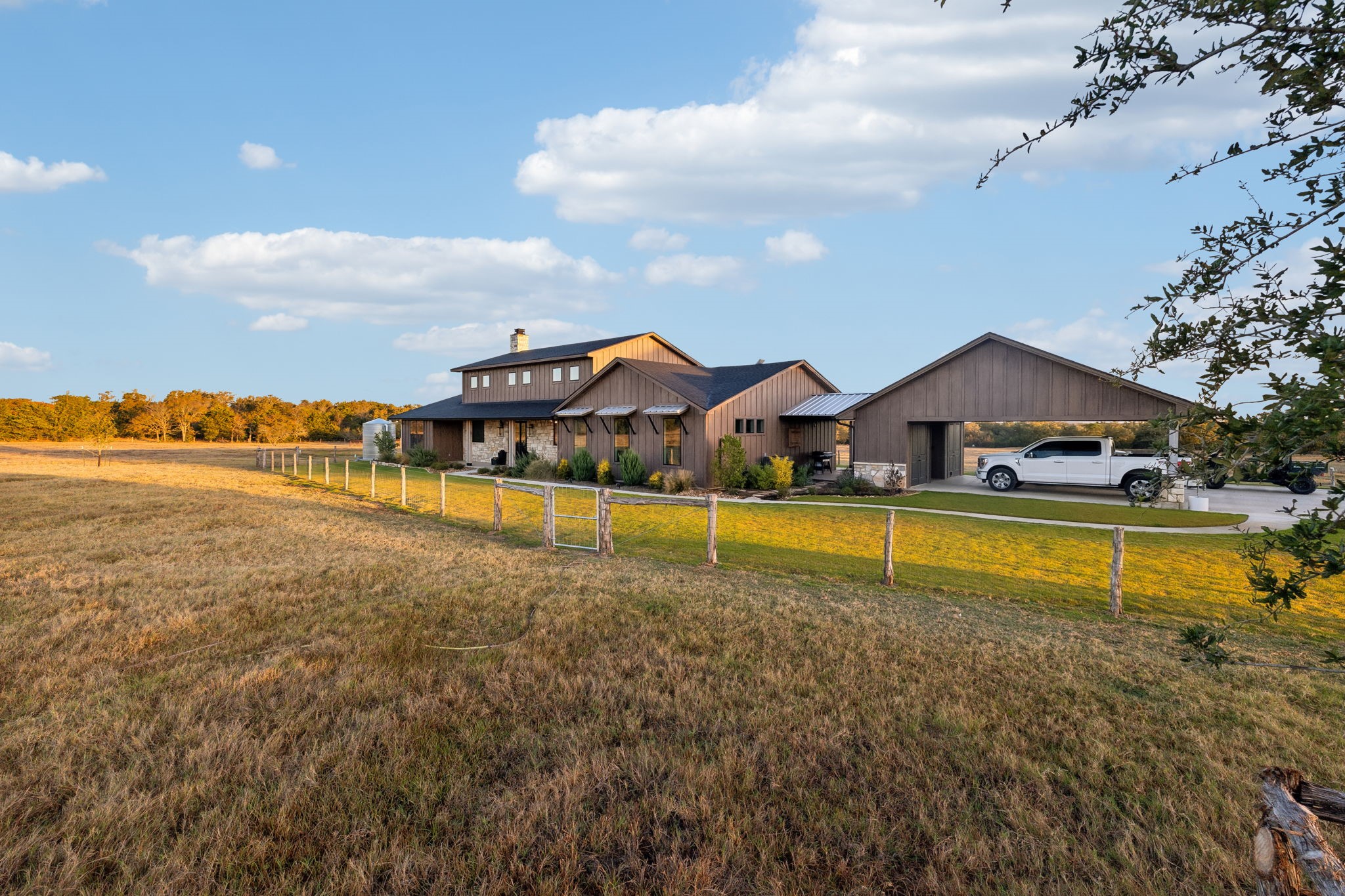 10433 County Road 162 Somerville, TX 77879 - Photo 6 of 40 a view of a house with a big yard and large trees
