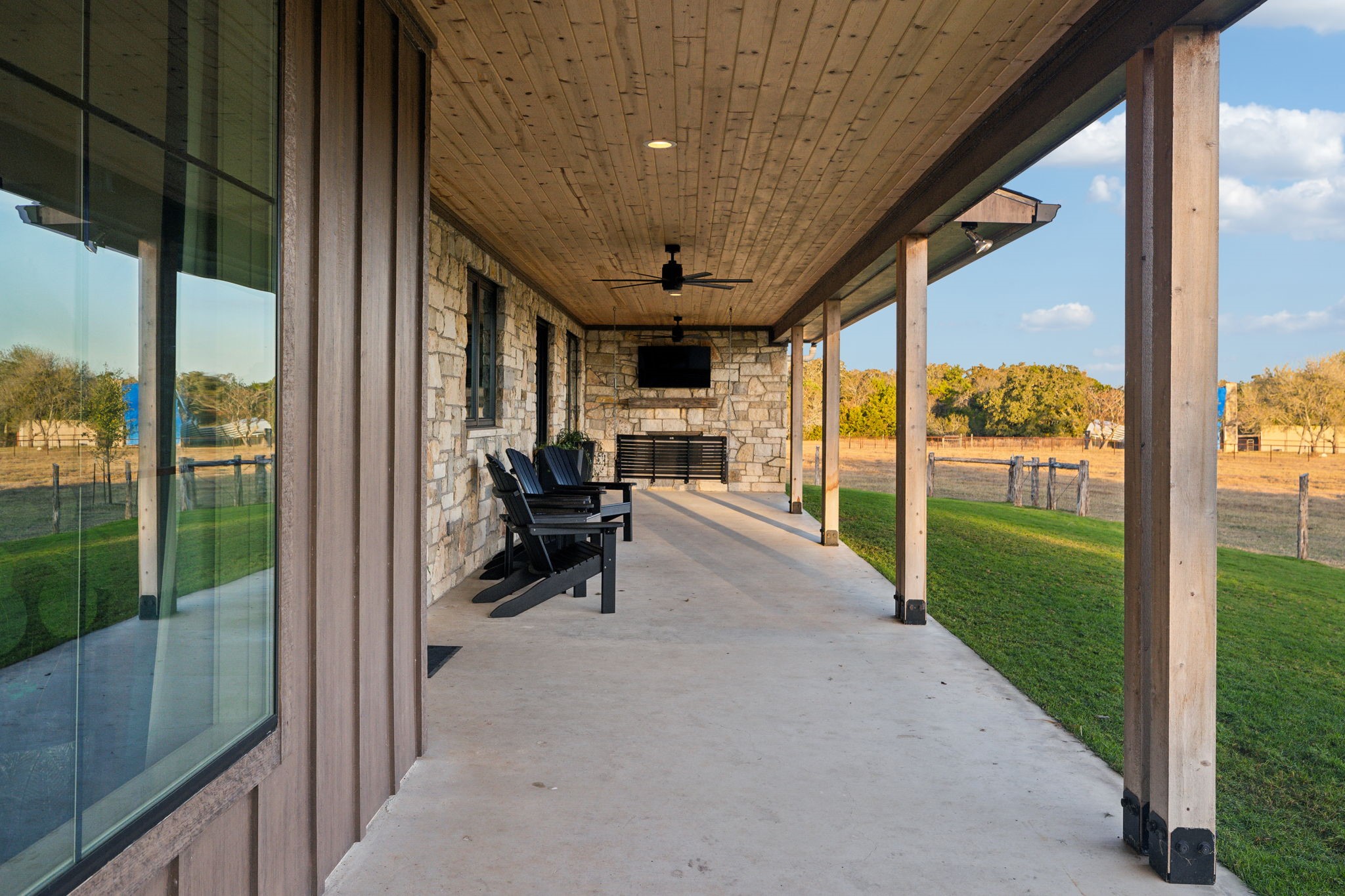 10433 County Road 162 Somerville, TX 77879 - Photo 9 of 40 a view of a porch with chairs and backyard