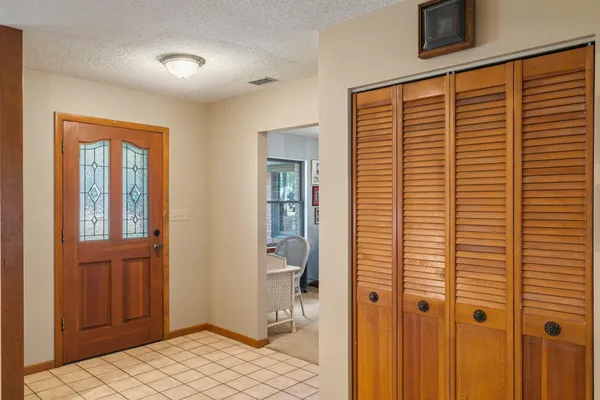 a view of a room that has a window in it