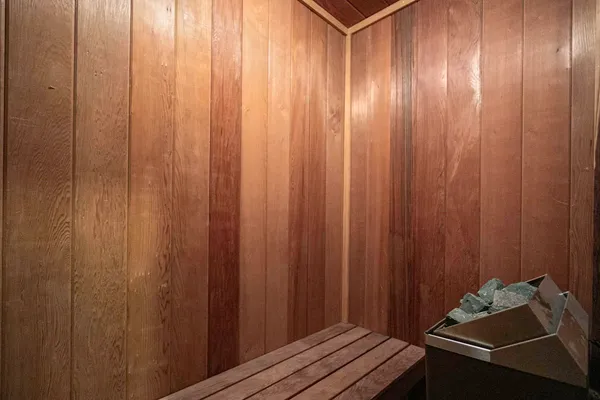 a room with a bed and a curtain