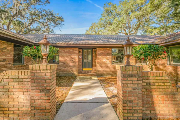 a view of a pathway with a patio