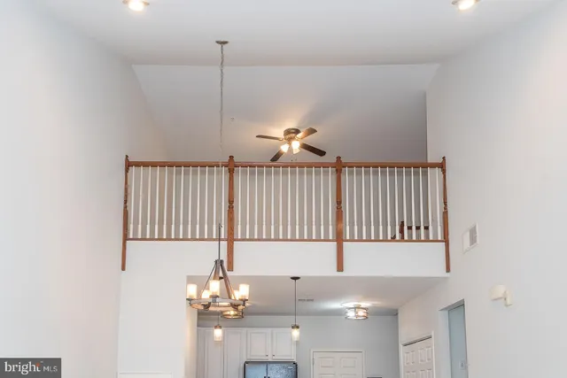 a view of multiple houses with a yard