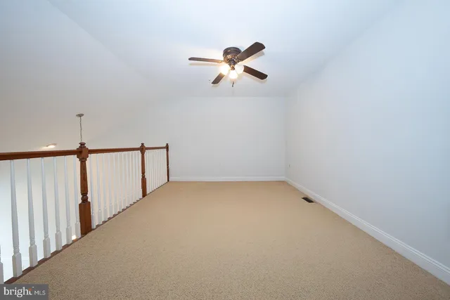 a view of a building with outdoor seating