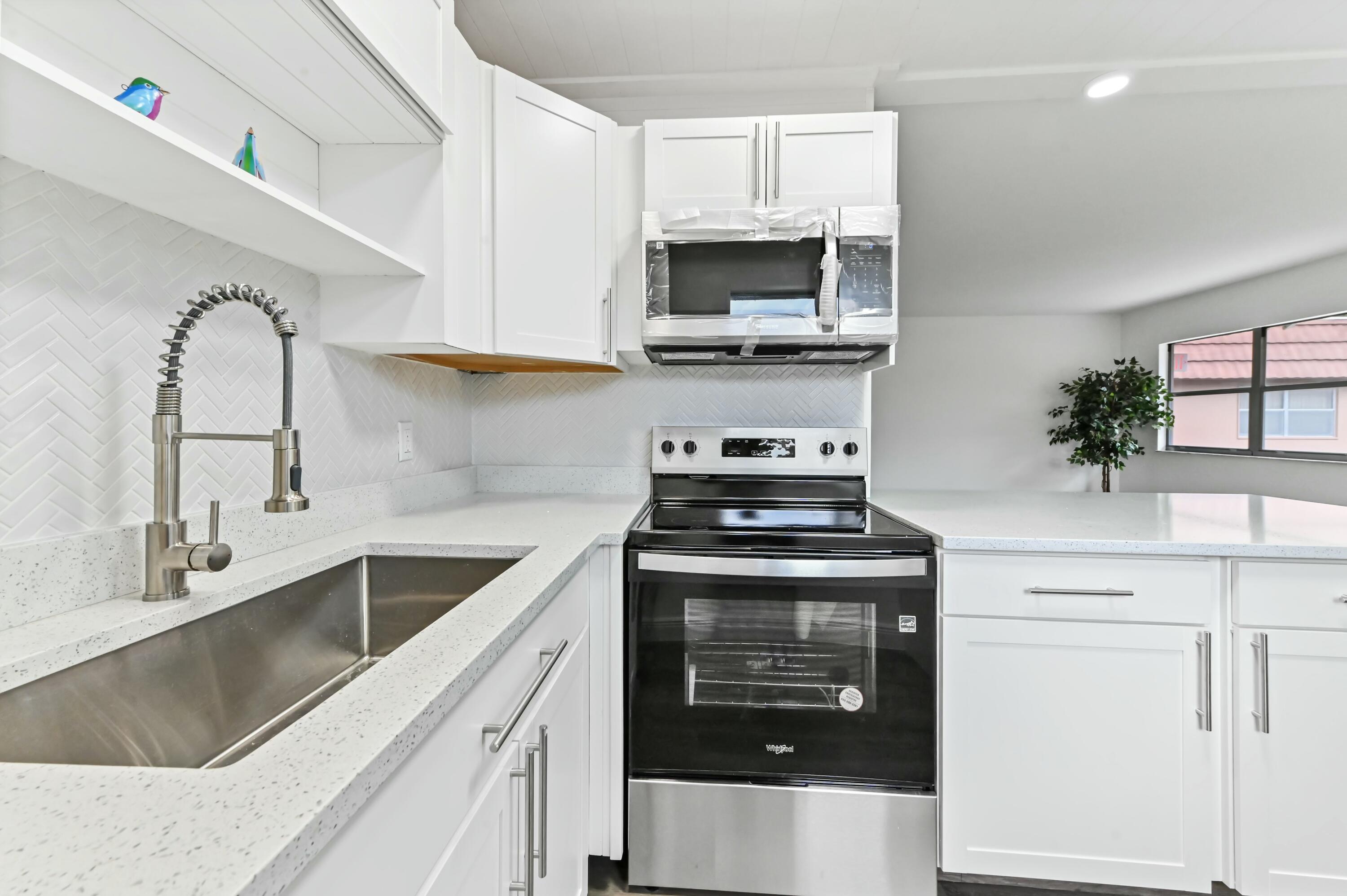 513 Saxony Drive Delray Beach, FL 33446 - Photo 11 of 40 subway tile backsplash